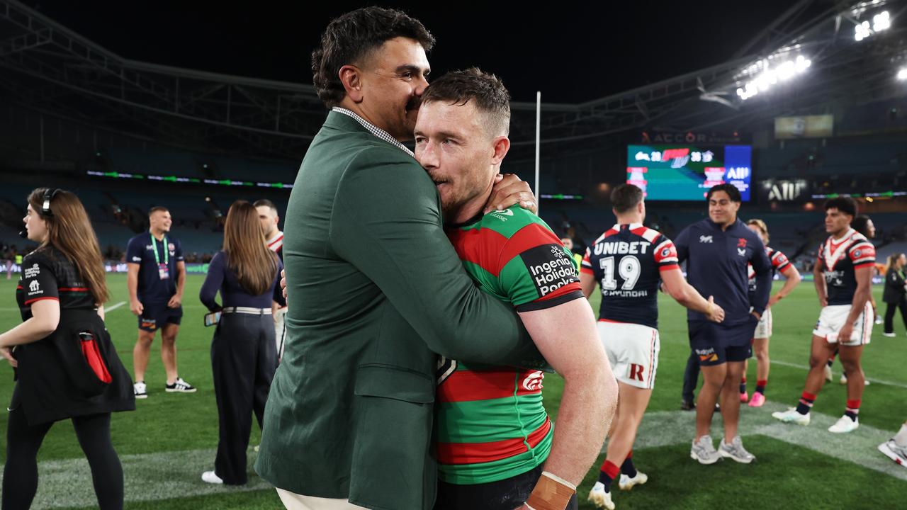 Damien Cook farewells Latrell Mitchell. Photo by Matt King/Getty Images.