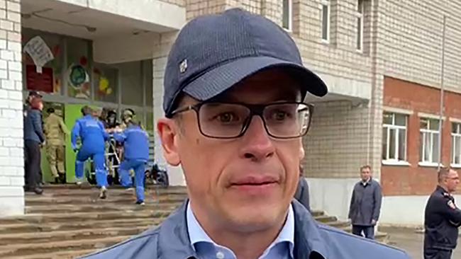 Alexander Brechalov, Head of the Udmurt Republic, speaking in front of school No88 in Izhevsk, where at least 13 people, including seven children, have died after a gunman opened fire. Picture: AFP/Telegram