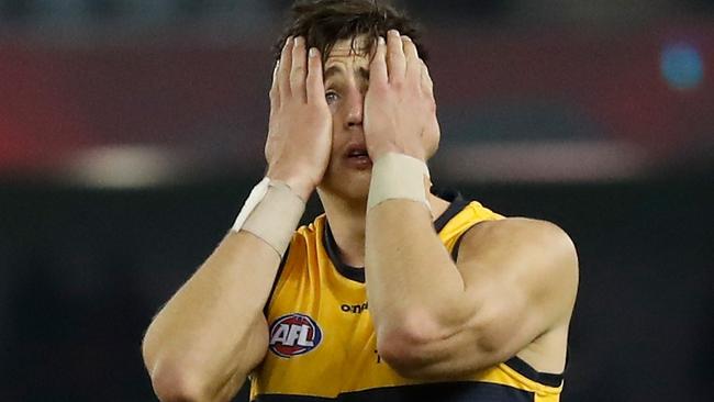 Jake Kelly looks dejected after the loss to the Bombers. Picture: AFL Photos/Getty Images