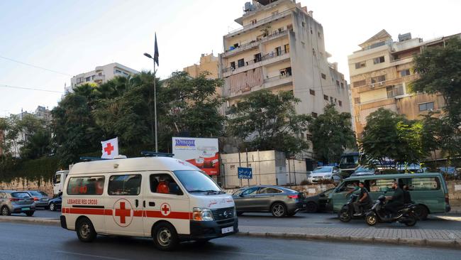 A Lebanese Red Cross ambulance rushes wounded people to a hospital in Beirut. Picture: AFP