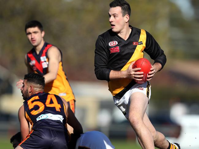 Jarrod Petersen of Westmeadows runs out of the centre during the EDFL football match between East Keilor and Westmeadows played at Overland Reserve Keilor on Saturday 20th July, 2019