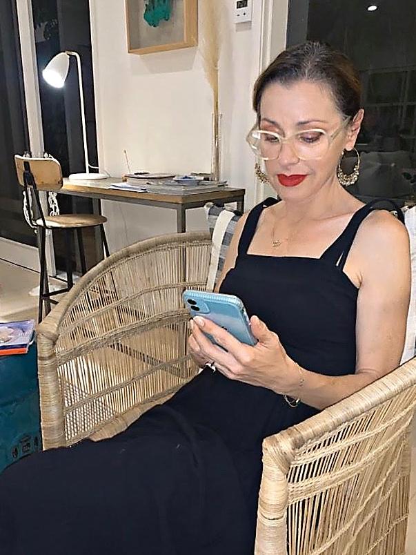 Arena at home in lockdown planning her Instagram Live sessions. (Picture: Supplied)