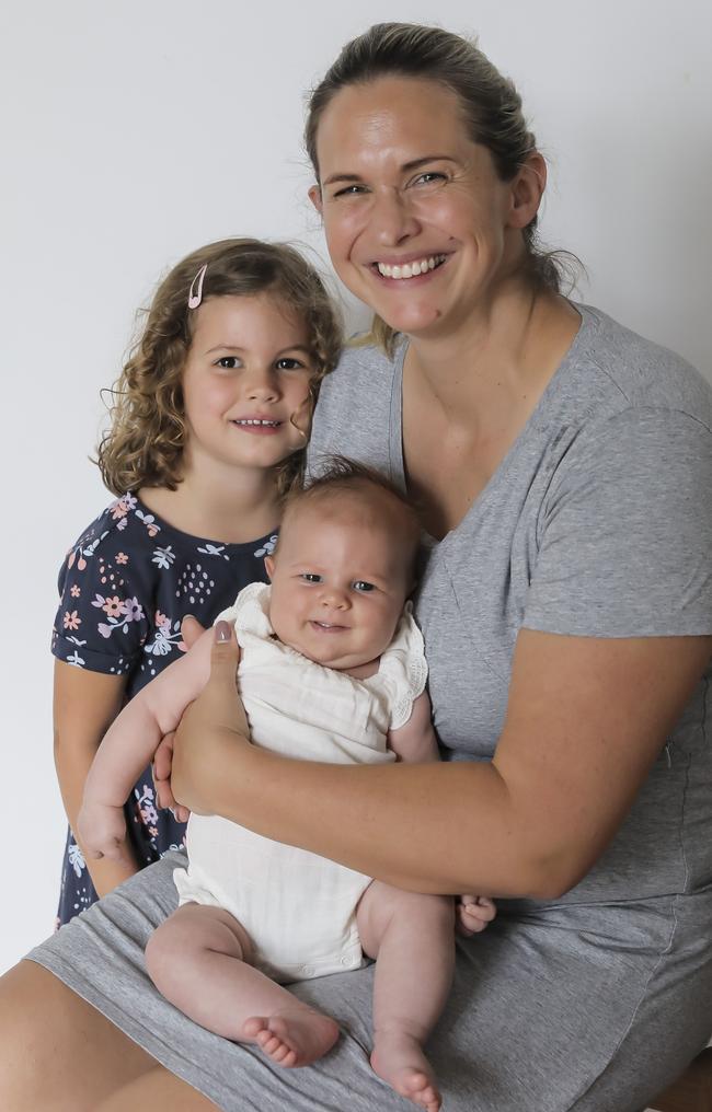 Libby Trickett with two of her daughters Poppy, 4, and Bronte Rose, seven weeks. Picture: Mark Cranitch