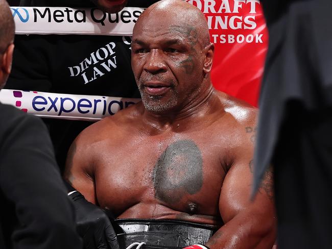 ARLINGTON, TEXAS - NOVEMBER 15: Mike Tyson fights during LIVE On Netflix: Jake Paul vs. Mike Tyson at AT&T Stadium on November 15, 2024 in Arlington, Texas. (Photo by Al Bello/Getty Images for Netflix Ã&#130;Â© 2024)