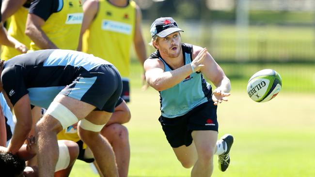 Matt Lucas passes during a NSW Waratahs training session.