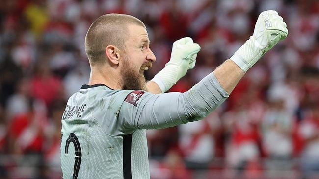 Andrew Redmayne celebrates the save that secured AQustralia a spot at the World Cup. Picture: Karim Jaafar/AFP