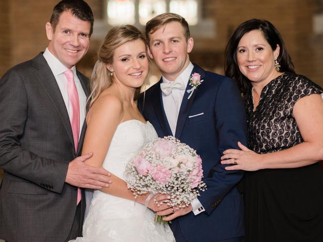 Former NSW premier Mike Baird with his daughter Laura, son-in-law Levi Baker and wife Kerryn at Laura and Levi’s recent wedding. Picture: James Day