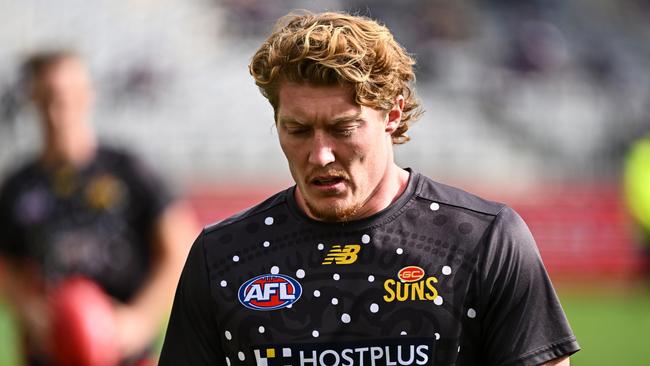 PERTH, AUSTRALIA - JUNE 23: Matt Rowell of the Suns warms up during the 2024 AFL Round 15 match between the Fremantle Dockers and the Gold Coast SUNS  at Optus Stadium on June 23, 2024 in Perth, Australia. (Photo by Daniel Carson/AFL Photos via Getty Images)