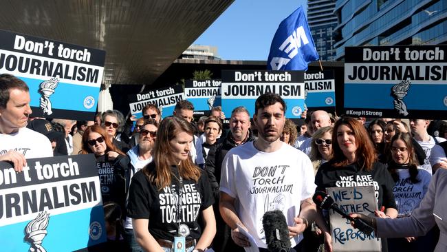 The Age state political reporter Broede Carmody addresses Nine newspaper employees and freelancers during their strike for fairer pay. Picture: Andrew Henshaw