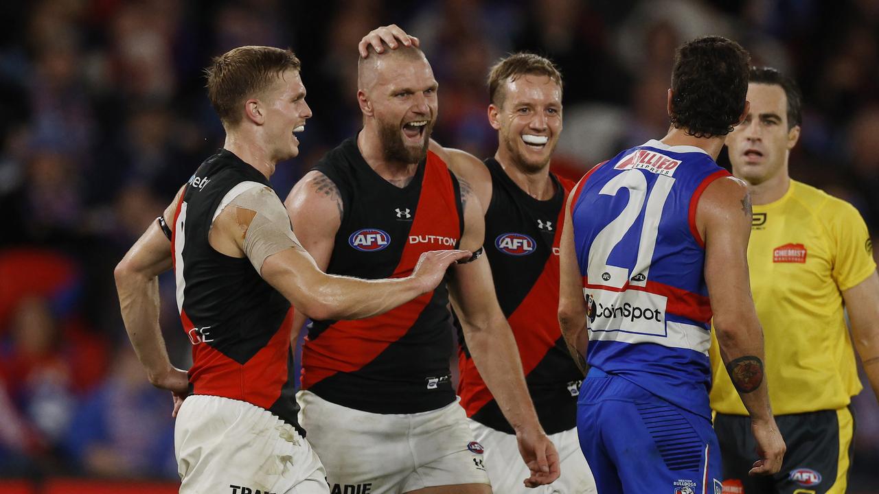 Jake Stringer of the Bombers celebrates a goal and lets Bulldog Tom Liberatore know all about it. Picture: Michael Klein