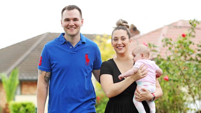 Eddie Dilleen, with wife Francesca and child Aurora, lives in Sydney. Picture: Tim Hunter.