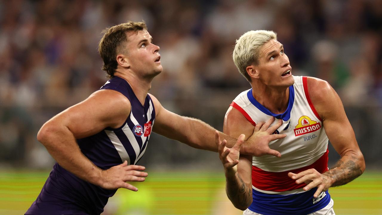 PERTH, AUSTRALIA - APRIL 21: Sean Darcy of the Dockers contests a ruck with Rory Lobb of the Bulldogs during the 2023 AFL Round 06 match between the Fremantle Dockers and the Western Bulldogs at Optus Stadium on April 21, 2023 in Perth, Australia. (Photo by Will Russell/AFL Photos via Getty Images)