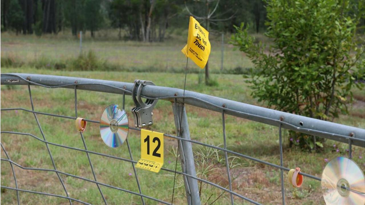 A pair of handcuffs owned by one of the slain officers was attached to the front fence of the Train property after they were murdered.