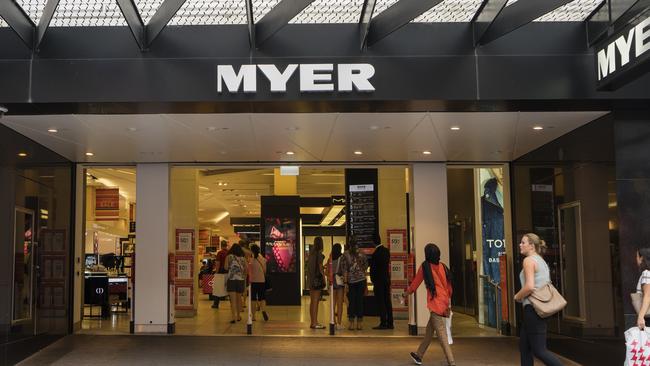 Melbourne, Australia - December 26, 2016: Three ladies enter the Myer store at Bourke Street Mall. The department store was open for Boxing Day sales.