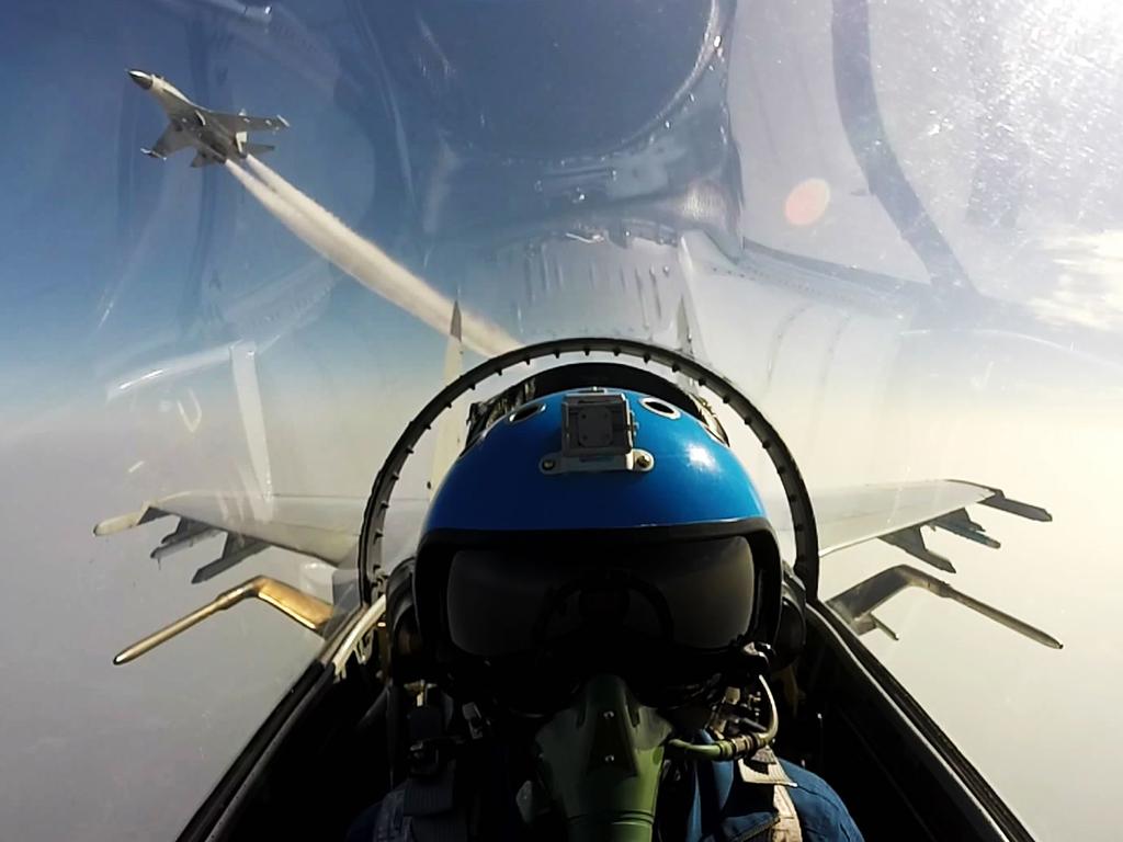 Chinese jet fighters during a military drill in the South China Sea near China's Hainan Island. Picture: AFP PHOTO / STR