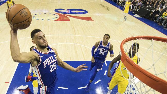 Ben Simmons closes in on a dunk for the Philadelphia 76ers.