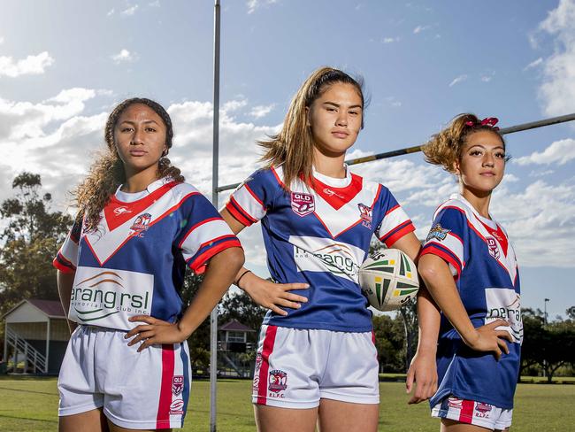 Up-and-coming female Nerang Roosters rugby league players, Xha'Van'Ye Peyroux, 13, Sunny Gerrard, 14, and Tavarna Papalii, 13, are excited about the start of the NRL Women's Premiership. Picture: Jerad Williams