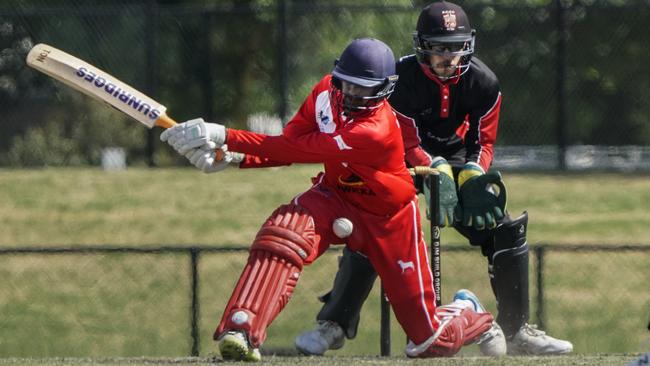 Mordialloc batter AKV Tyrone and South Caulfield keeper Elliott Bradley. Picture: Valeriu Campan