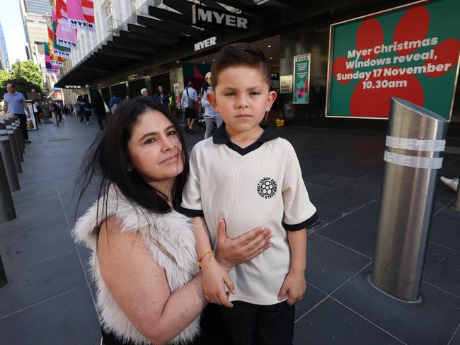 People reacting to the potential for Myer Christmas windows launch to be canceled this year, due to the planned protests. Carolina Henao, 44, and son Valentino, 7 out the front of Myer in Melbourne. Picture: Alex Coppel