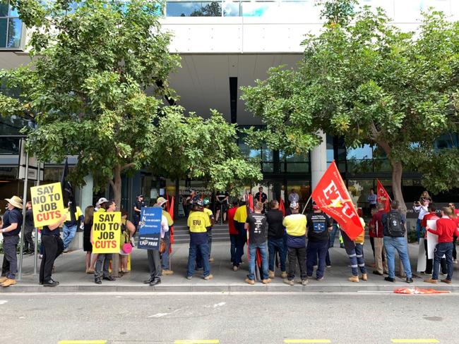 Refugee and union protesters wait outside for Scott Morrison and Deb Frecklington ahead of an LNP luncheon Brisbane Times/ Matt Dennien