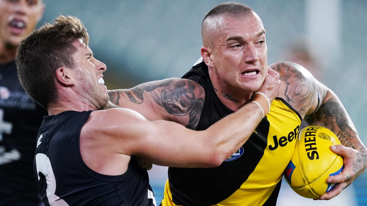 Dustin Martin and Marc Murphy clash during Round 1 of the 2020 season. Picture: AAP Image/Michael Dodge