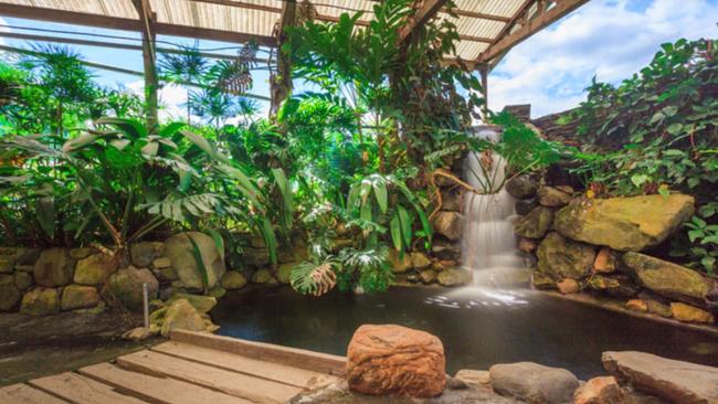 An established water feature in the grounds of the Catch A Barra property.