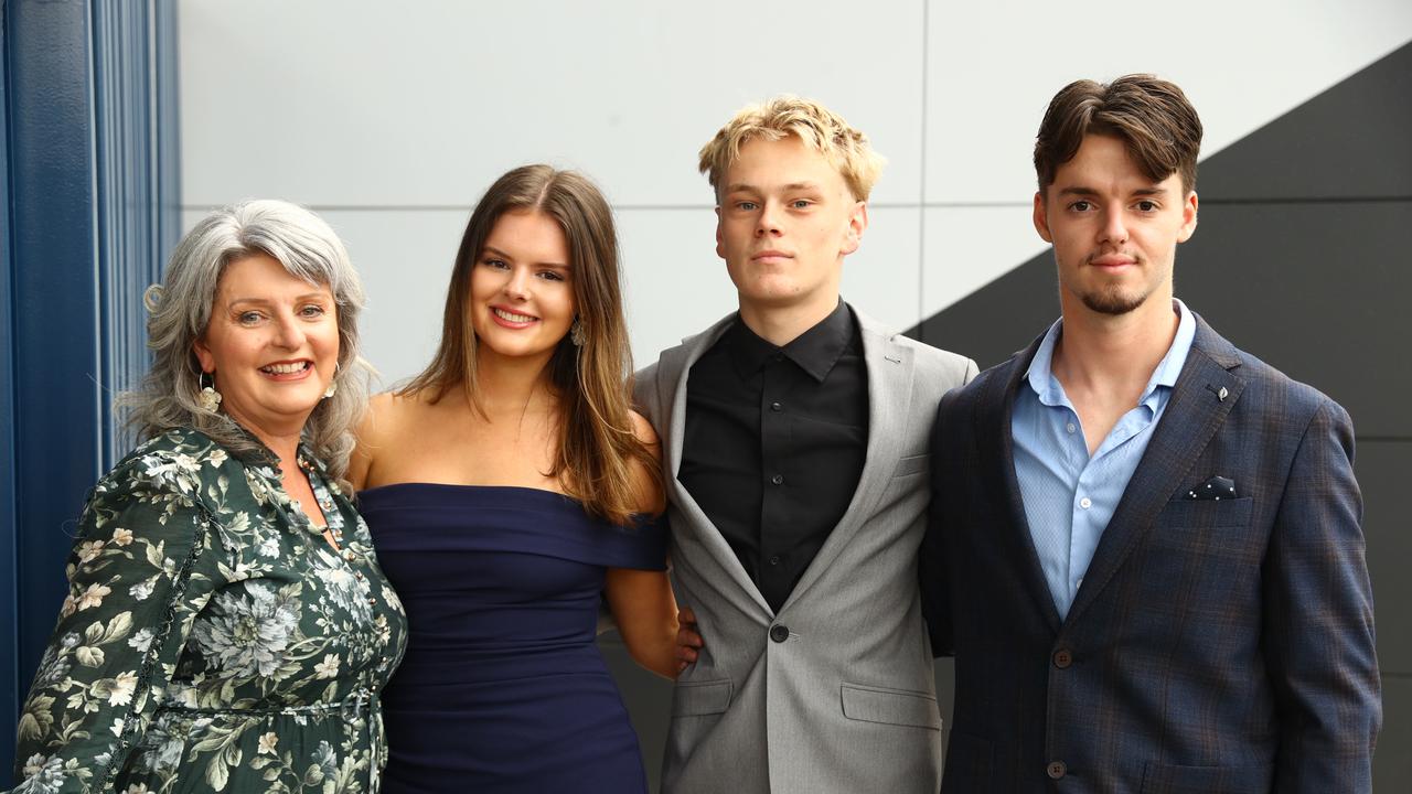 Graduate Bethany Dean with mum Julia and boyfriend Jai Rogers and brother Nate at the Belmont High School year 12 graduation at GMHBA Stadium. Picture: Alison Wynd