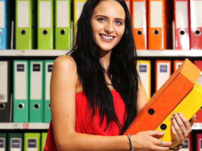 Chelsea McManaway, 19, Wooloowin, (0478762207) browses the shelves at Wilston Officeworks. Officeworks half year results were published today(150217).Photo: Claudia Baxter