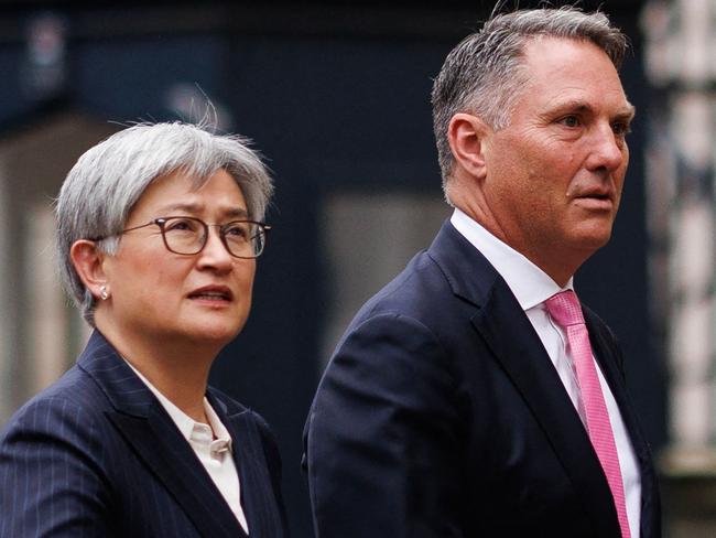 Australia's Foreign Minister Penny Wong (L) and Australia's Deputy Prime Minister and Defence Minister Richard Marles arrive at Lancaster House for the annual Australia-UK Ministerial Consultations (AUKMIN) meeting in London on December 16, 2024. (Photo by Dan Kitwood / AFP)