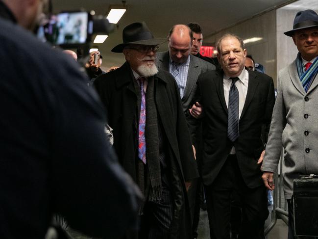 Harvey Weinstein, second from right, faces a possible life sentence in prison. Picture: AFP