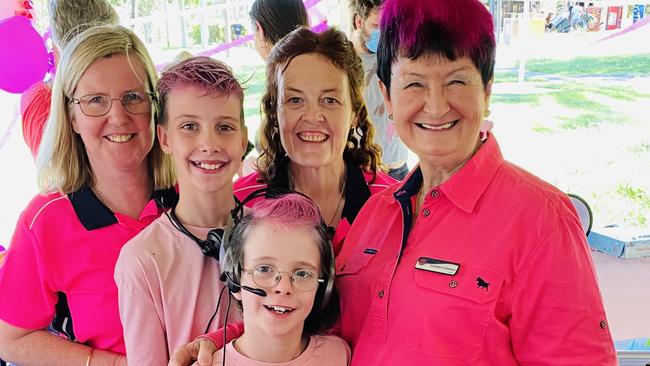 Paediatrician Dr Lauren Watson, wife Lynnelle and their sons Oliver and Max (front), dressed as their favourite teacher, Elizabeth Kriesch, at one of her many retirement parties. Picture: Lauren Watson