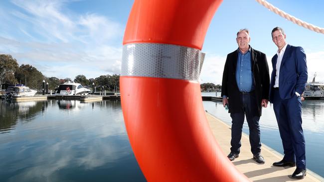 Johnson Property Group CEO Keith Johnson and Metricon NSW General Manager Luke Fryer at the Trinity Point marina. Picture: Sue Graham