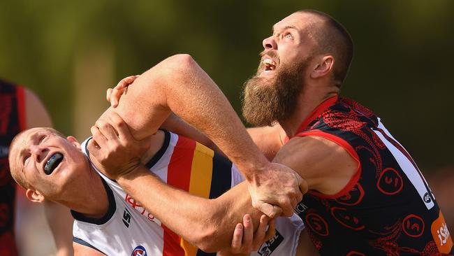 Melbourne ruckman Max Gawn pushes Adelaide’s Sam Jacobs out of the way. Picture: Getty Images