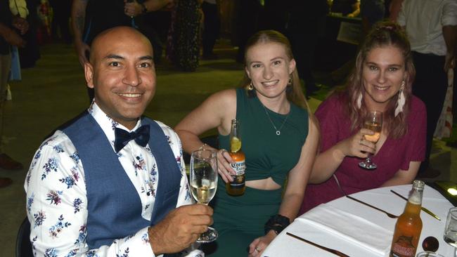 (From left) Charles, Anthea and Melissa at the Apple and Grape Gala Ball on Friday, March 1, 2024. Photo: Jessica Klein