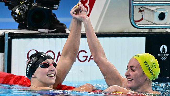 Katie Ledecky and Ariarne Titmus after the final of the women's 800m freestyle in Paris. Picture: AFP