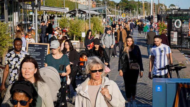 People walk on Stranvagen in Stockholm. Picture: AFP.