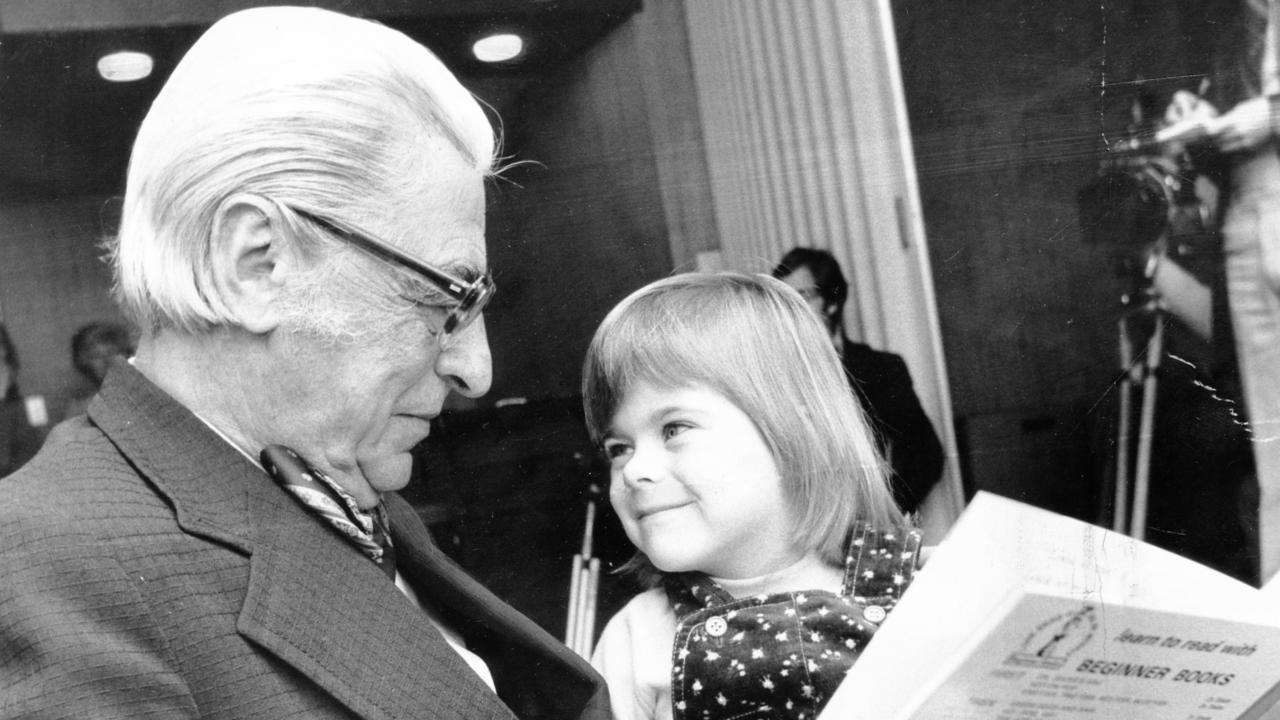 American author of the Dr. Seuss books, Theodor Seuss Geisel, in 1976 reading with Kimberley Campbell, 3, in Adelaide during an Australian tour of city centres. Picture: News Corp Australia