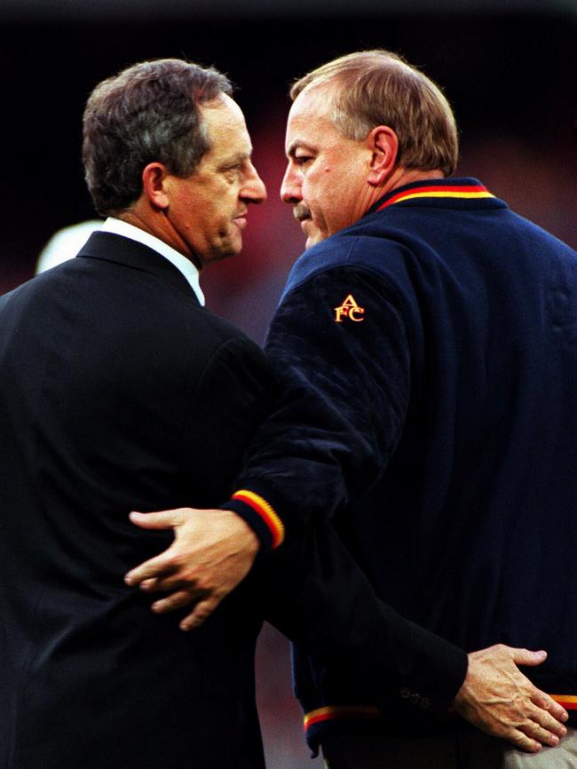 Adelaide coach Malcolm Blight with St Kilda coach Stan Alves after the Crows’ 1997 AFL grand final win.