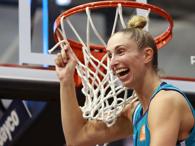 MELBOURNE, AUSTRALIA - MARCH 17: Rebecca Cole (c) of the Flyers cuts the net after winning the WNBL Championship during the game three of the WNBL Grand Final series between Southside Flyers and Perth Lynx at Melbourne Sports Centre Parkville, on March 17, 2024, in Melbourne, Australia. (Photo by Kelly Defina/Getty Images) (Photo by Kelly Defina/Getty Images) *** BESTPIX ***