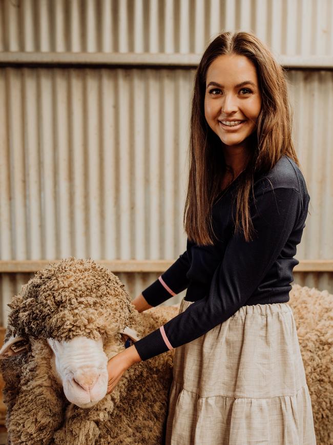 Emily with one of her sheep.