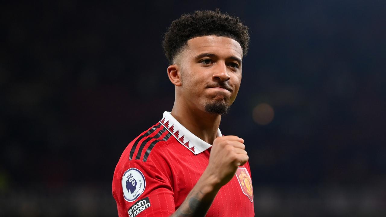 MANCHESTER, ENGLAND - AUGUST 22: Jadon Sancho of Manchester United celebrates after victory in the Premier League match between Manchester United and Liverpool FC at Old Trafford on August 22, 2022 in Manchester, England. (Photo by Michael Regan/Getty Images)