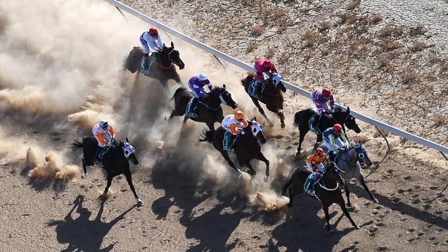 An aerial view of the field during the Birdsville Cup. (AAP Image/Dan Peled)