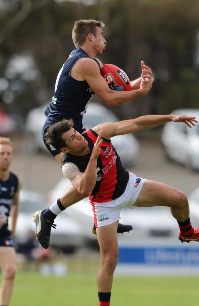 South star Joel Cross soars over West’s Logan Hill. Picture: Nick Hook Photography 