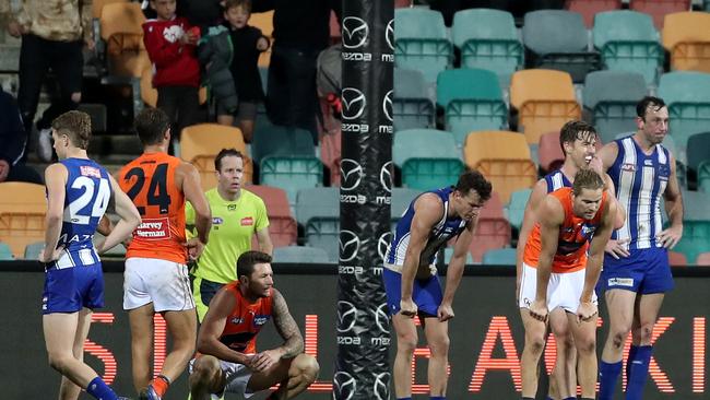 Players from both sides didn’t know how to react after the first draw of 2021. Picture: Mark Metcalfe/AFL Photos/via Getty Images