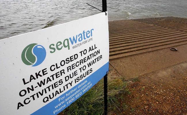Atkinson Dam was closed over the weekend due to increases in blue-green algae (right). . Picture: Sarah Harvey