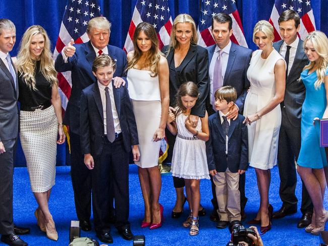 NEW YORK, NY - JUNE 16:   (L-R) Eric Trump, Lara Yunaska Trump, Donald Trump, Barron Trump, Melania Trump, Vanessa Haydon Trump, Kai Madison Trump, Donald Trump Jr., Donald John Trump III, Ivanka Trump, Jared Kushner, and Tiffany Trump pose for photos on stage after Donald Trump announced his candidacy for the U.S. presidency at Trump Tower on June 16, 2015 in New York City. Trump is the 12th Republican who has announced running for the White House.  (Photo by Christopher Gregory/Getty Images)