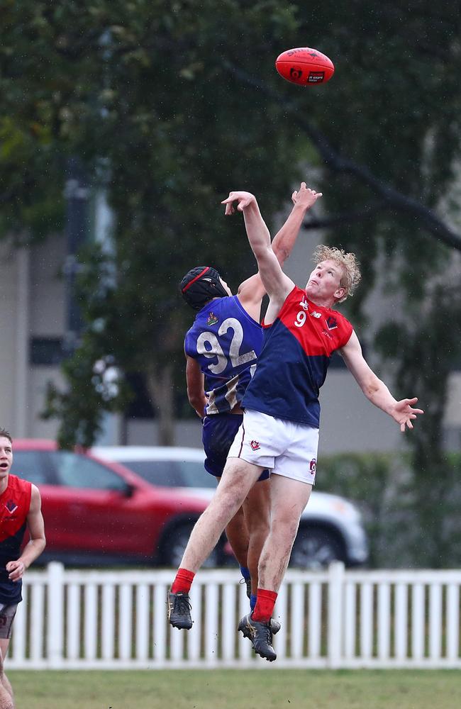 Action from the QAFL Colts game between Mt Gravatt and Surfers Paradise