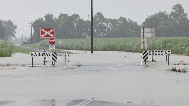 A monsoonal tropical low pressure system has brought devastating widespread flooding to North Queensland and parts of Far North Queensland, with over 1000 millimetres of rain recorded in Cardwell. Queensland Rail tracks at Euramo, near Tully, have been submerged under flood water, and will need to be inspected for damage before train services resume. Picture: Brendan Radke