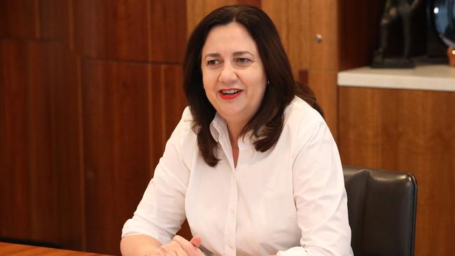 Premier Annastacia Palaszczuk with her shirt sleeves rolled up, back at work, 1 William Street, Brisbane. Photographer: Liam Kidston.