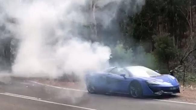 McClaren supercar on fire in Adelaide Hills. Picture: Harry McCallum